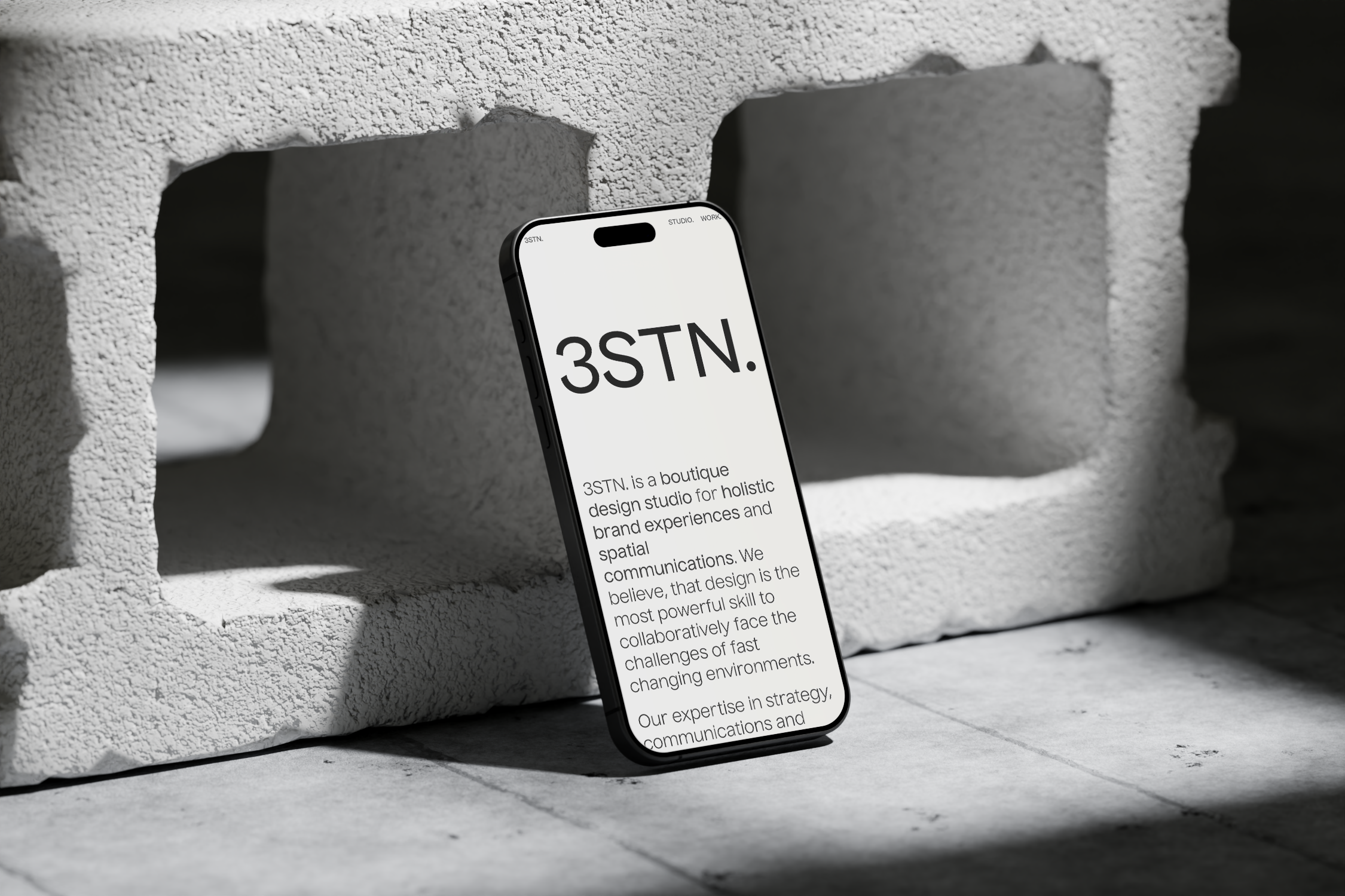 240621_3STN_CD_Iphone-15-Pro_Concrete-Brick_Mockup